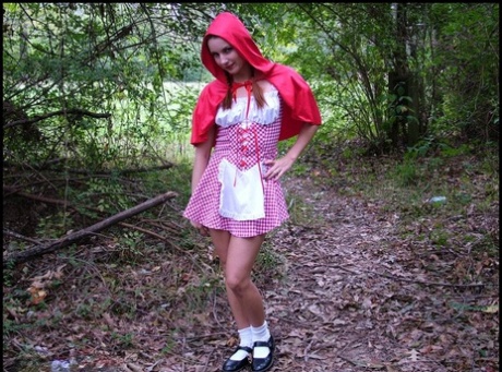 Amateur girl Amber Lily frees tits and twat from Little Red Riding Hood outfit