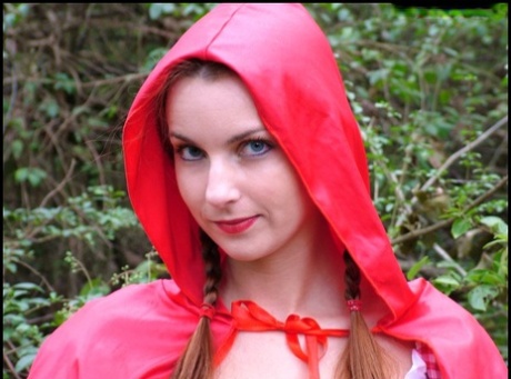 Amateur girl Amber Lily frees tits and twat from Little Red Riding Hood outfit
