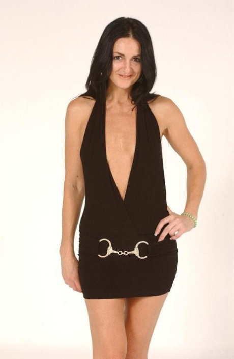 Brunette MILF Lake Russell sets her natural tits free of a short dress