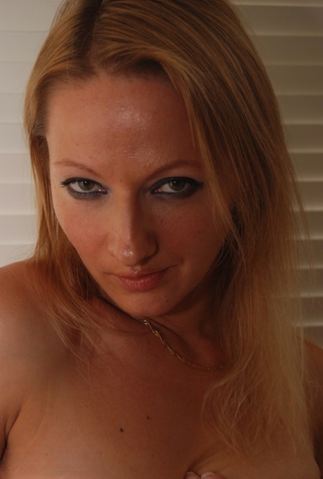 British amateur Lady Sextasy cups her natural tits before showing her slit