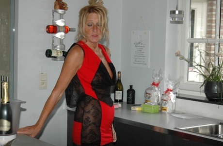 Amateur older slut Kyra in sexy dress and stockings rubbing her horny clit