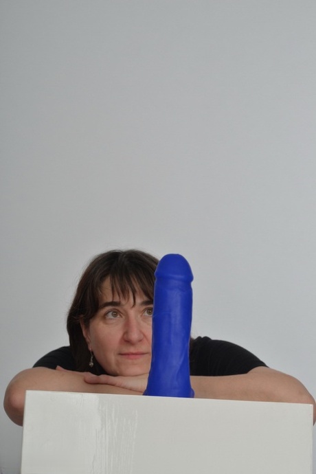 Amateur slut with saggy boobs riding a big blue dildo so damn good