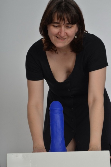 Amateur slut with saggy boobs riding a big blue dildo so damn good