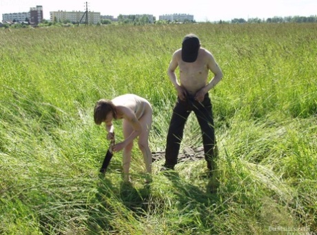 White girl fucks a homeless military man in the privacy of long grasses