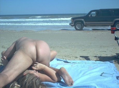 Glasses wearing amateur BBW gets gangbanged on a nude beach