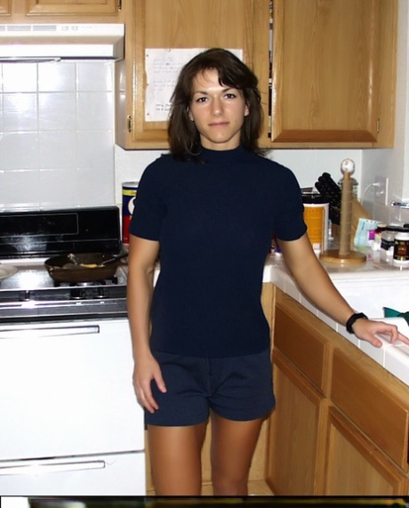 Female bodybuilder Venus flexes her hard body while in her bathroom