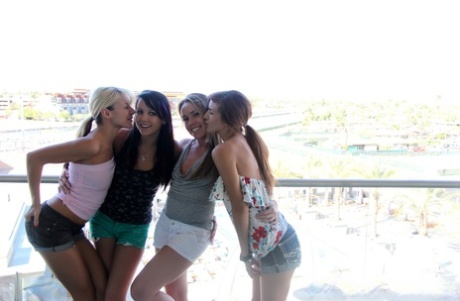 Teen amateur Andi Land and her girlfriends expose their tiny tits and butts