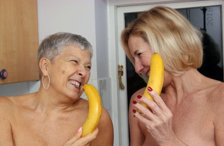 Granny lesbians lick each others nipples before using bananas as dildos