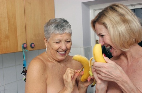 Granny lesbians lick each others nipples before using bananas as dildos