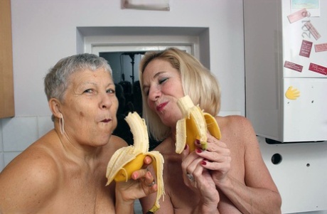 Granny lesbians lick each others nipples before using bananas as dildos