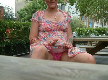 Old British woman squats atop a beer bottle while masturbating in public