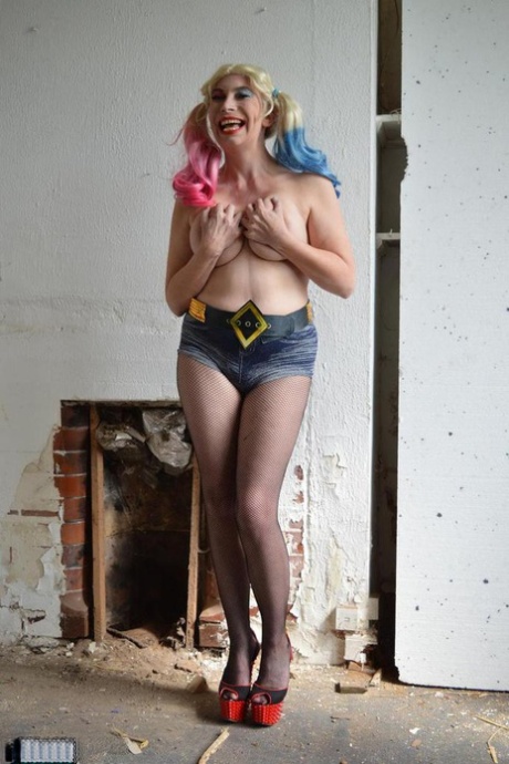 Cute blonde Barby Slut takes a baseball bat to her snatch in crotchless hose