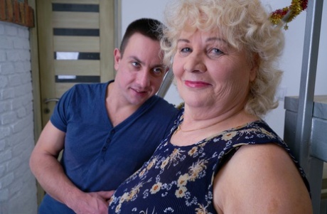Old blonde woman cheats on her husband with a much younger gentleman