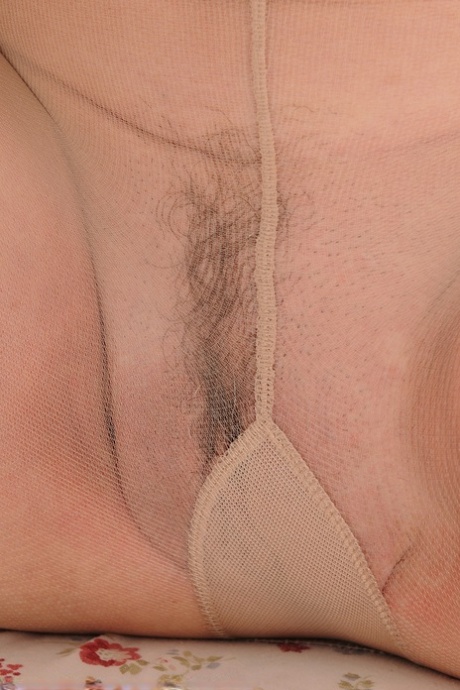 Smiley mature Jenna Covelli displays long hard nipples & pussy in pantyhose