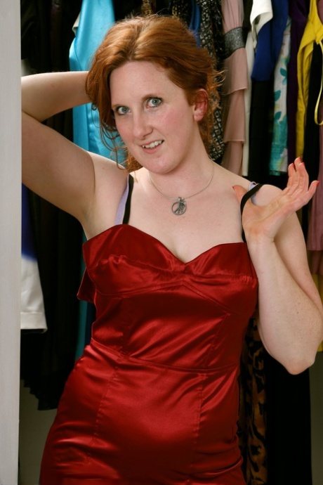 Over 30 redhead Aella Rae strokes her snatch after trying on lingerie
