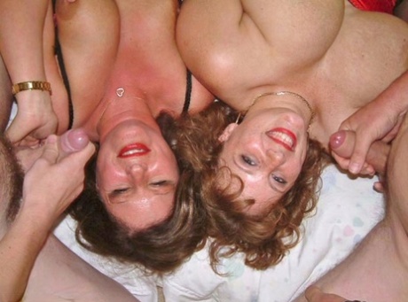 Older British amateur Curvy Claire and a girlfriend partake in a hardcore orgy