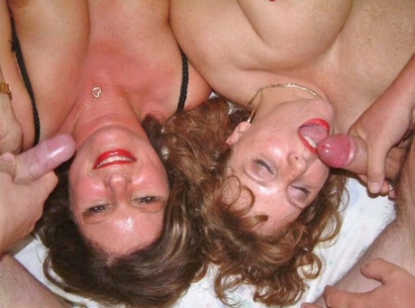 Older British amateur Curvy Claire and a girlfriend partake in a hardcore orgy