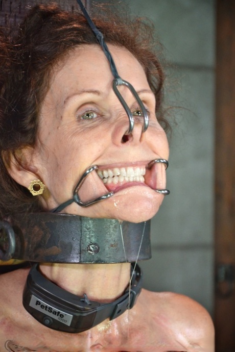 Mature women Emma & Emma Haize are totally humiliated in a dungeon setting
