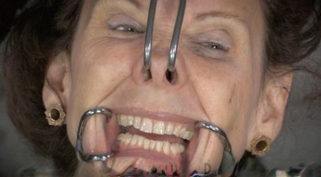Mature women Emma & Emma Haize are totally humiliated in a dungeon setting