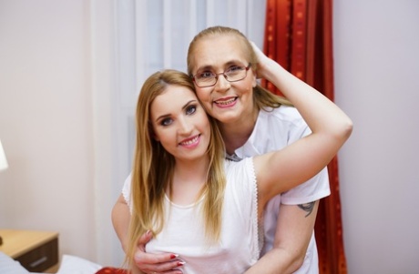 Old and young lesbians Violett & Lulu Love 69 while having sex on a bed