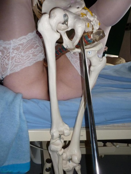 Older redhead nurse Valgasmic Exposed gets banged by a dildo wielding skeleton