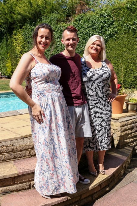 Mature fatties catch jizz on their tits during a threesome with a young lad