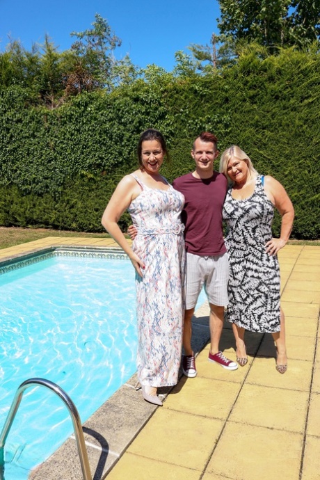 Mature fatties catch jizz on their tits during a threesome with a young lad