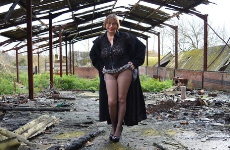 Amateur chick Barby Slut strips to her heels on a demolition site
