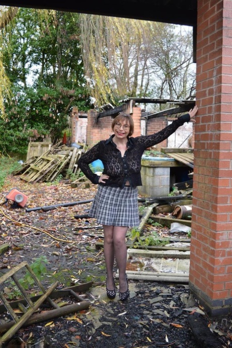 Amateur chick Barby Slut strips to her heels on a demolition site