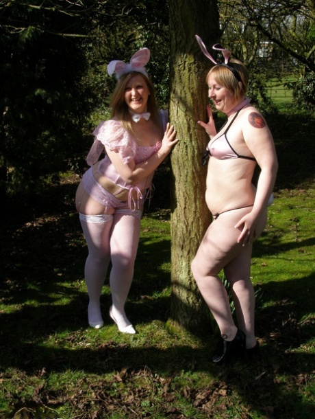 Amateur fatties expose their tits in a yard while wearing cosplay outfits