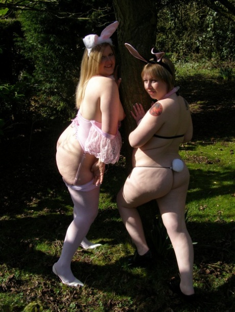 Amateur fatties expose their tits in a yard while wearing cosplay outfits