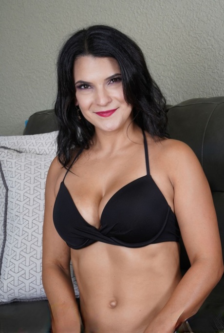 30 plus brunette Mio Moore removes her bikini for first nude gig