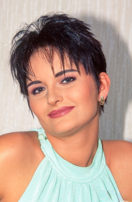 Brunette chick Eveline sports short hair during the course of a gangbang