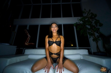Mia Moore & Zerella Skies tongue kiss in front of a hunky black man