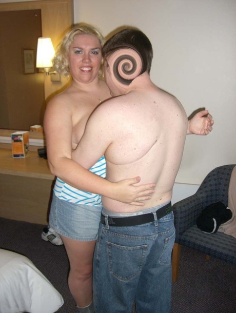 Older blonde Barby sucks off a cock after getting naked in a hotel room