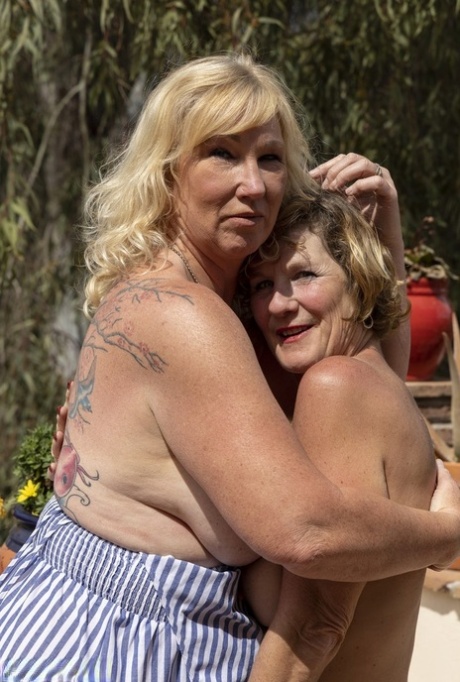 Mature fatty Melody has lesbian sex on a sunny patio with a girlfriend