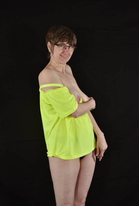 Amateur woman Hot MILF strips off her clothing in glasses and footwear