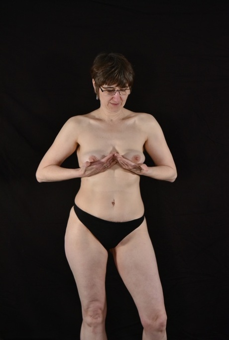 Amateur woman Hot MILF strips off her clothing in glasses and footwear
