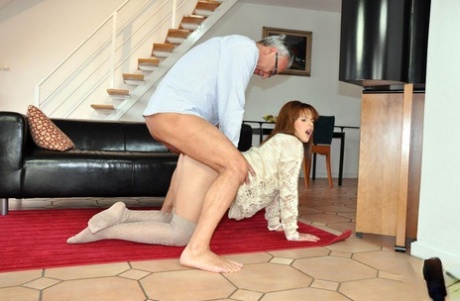 Natural redhead in over the knees socks lets an old man fuck her tight pussy