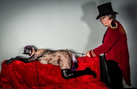 Mature fatty Layla Bird gives a deepthroat blowjob during costume play