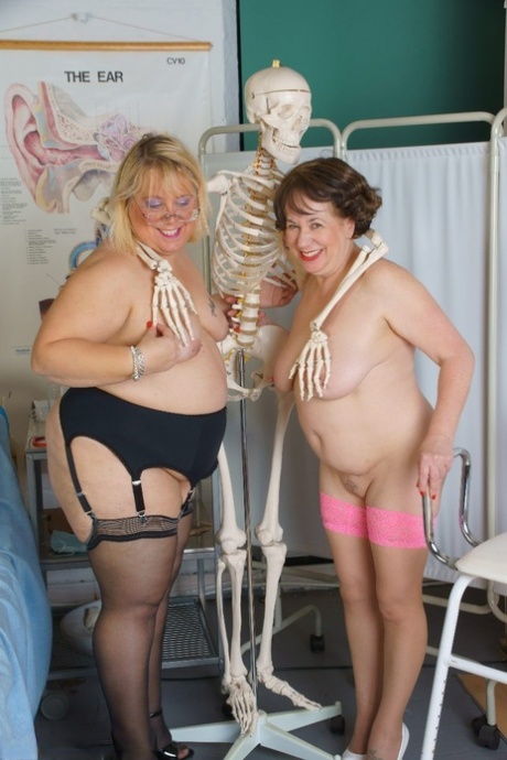 British fatty Lexie Cummings engages in lesbian play with an older plumper