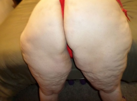 Mature fatty Bunny Gram frees her pretty feet from ankle strap heels