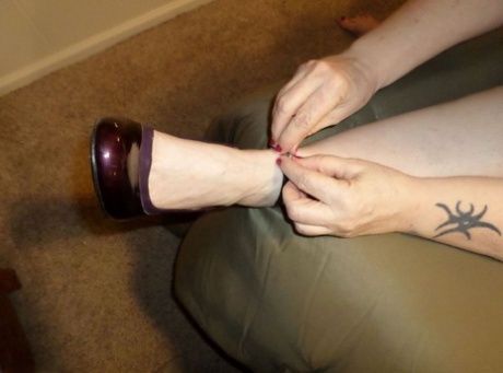 Mature fatty Bunny Gram frees her pretty feet from ankle strap heels