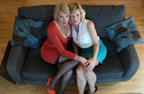 British housewives kiss on their way to first lesbian sex experience