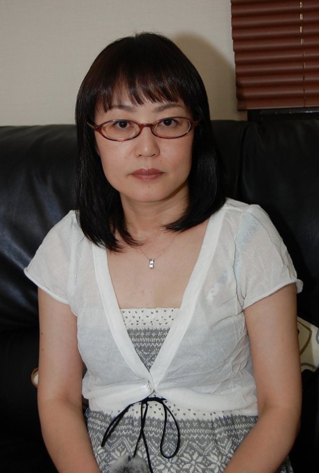 Shy asian lady in glasses strips down and has some pussy vibing fun