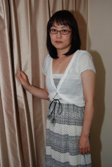 Shy asian lady in glasses strips down and has some pussy vibing fun