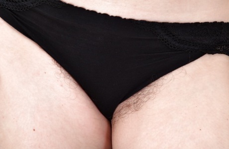 Mature European babe Sofia Matthews pets her wonderful hairy cunt