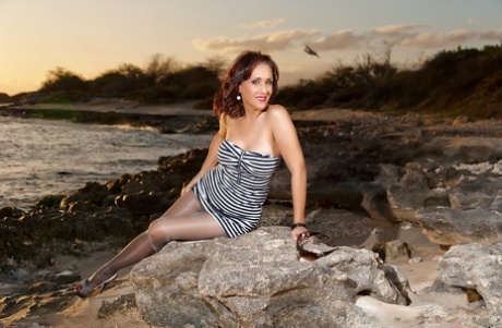Nature is one of many places that Roni takes poses and has fun