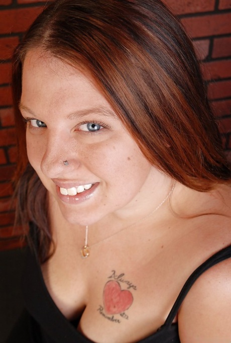Chubby old woman with tattoos Velvet plays with her saggy boobs