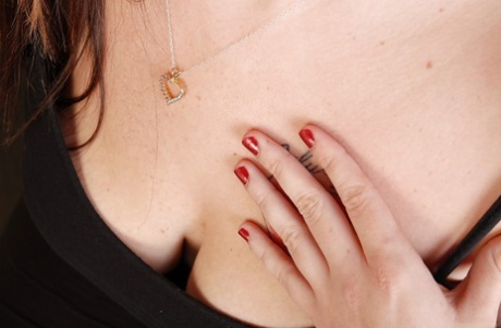 Chubby old woman with tattoos Velvet plays with her saggy boobs